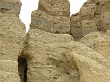 Tibet Guge 01 To 18 Sutlej Canyon Tower With Peter The sandstone cliffs of the Sutlej canyon have eroded into some fantastic shapes. Peter climbed into the cave and then up the side, with the sandstone breaking off in his hands.